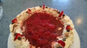 rich cheesecake with strawberry compote